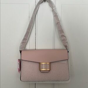 kate Spate medium convertible shoulder bag in the color Mochi Pink